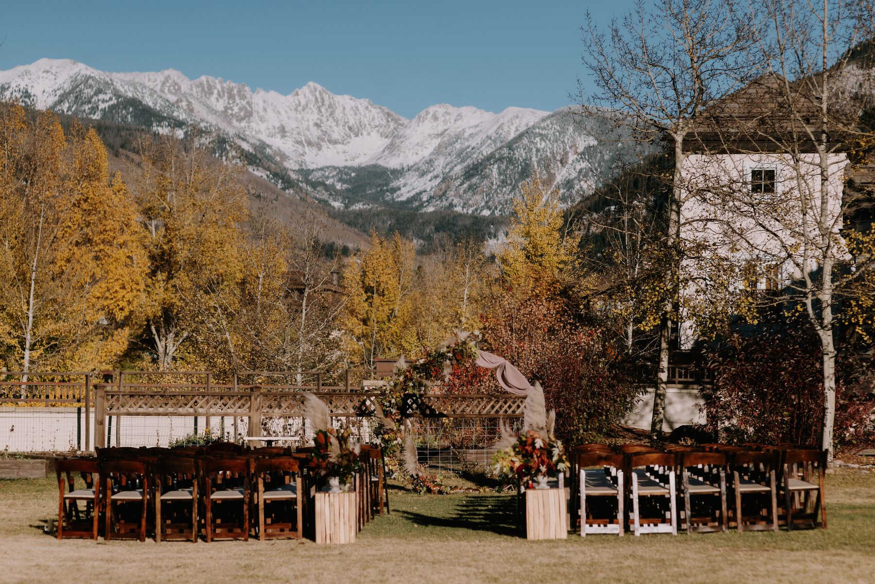Outdoor mountain venue overlooking snow-covered peaks