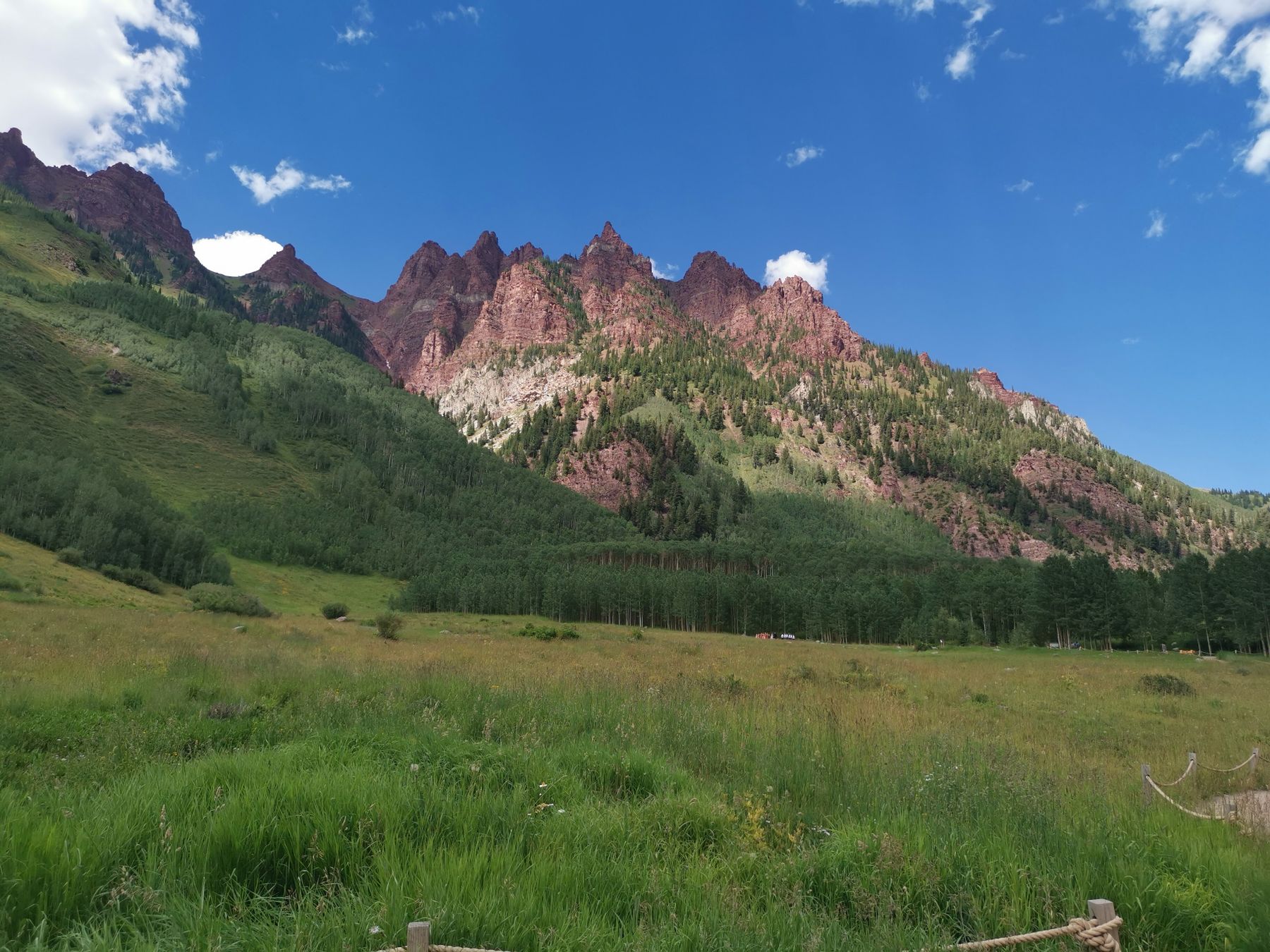 Maroon Bells rising above an alpine lake near Aspen