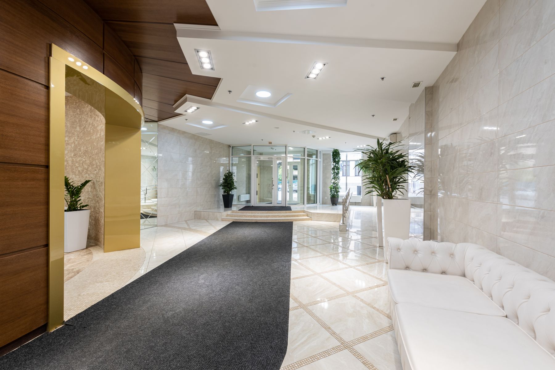 Bright contemporary interior with a polished stone floor